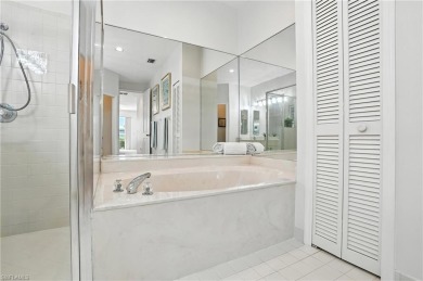 This 2-bedroom plus den villa offers sweeping golf course views on Estero Country Club in Florida - for sale on GolfHomes.com, golf home, golf lot