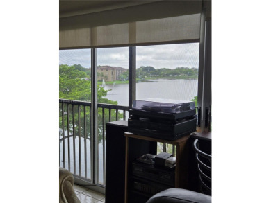Top floor Penthouse corner Magnolia unit. On the lake in one of on Flamingo Lakes Country Club in Florida - for sale on GolfHomes.com, golf home, golf lot
