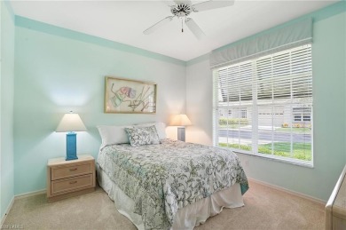 This 2-bedroom plus den villa offers sweeping golf course views on Estero Country Club in Florida - for sale on GolfHomes.com, golf home, golf lot
