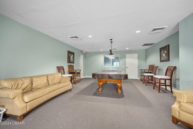 Experience luxury living in this beautiful two-bedroom on Oceans Golf Club in Florida - for sale on GolfHomes.com, golf home, golf lot