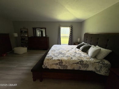 This Johnson-built block home is move in ready, located in the on Turnbull Bay Golf Club in Florida - for sale on GolfHomes.com, golf home, golf lot