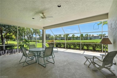 This 2-bedroom plus den villa offers sweeping golf course views on Estero Country Club in Florida - for sale on GolfHomes.com, golf home, golf lot