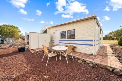 Great Location across from the green belt with panoramic sunset on Juniper Ridge R.V. Golf Resort in Arizona - for sale on GolfHomes.com, golf home, golf lot
