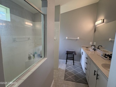 This Johnson-built block home is move in ready, located in the on Turnbull Bay Golf Club in Florida - for sale on GolfHomes.com, golf home, golf lot