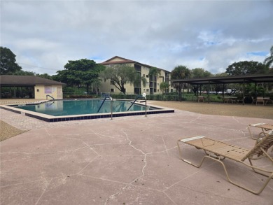 Top floor Penthouse corner Magnolia unit. On the lake in one of on Flamingo Lakes Country Club in Florida - for sale on GolfHomes.com, golf home, golf lot