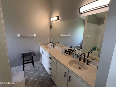 This Johnson-built block home is move in ready, located in the on Turnbull Bay Golf Club in Florida - for sale on GolfHomes.com, golf home, golf lot