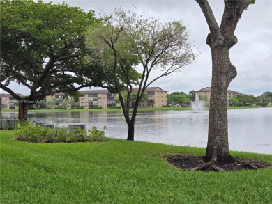 Top floor Penthouse corner Magnolia unit. On the lake in one of on Flamingo Lakes Country Club in Florida - for sale on GolfHomes.com, golf home, golf lot