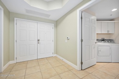 Experience luxury living in this beautiful two-bedroom on Oceans Golf Club in Florida - for sale on GolfHomes.com, golf home, golf lot