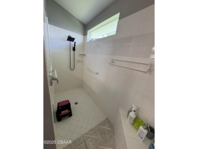 This Johnson-built block home is move in ready, located in the on Turnbull Bay Golf Club in Florida - for sale on GolfHomes.com, golf home, golf lot