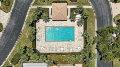This 2-bedroom plus den villa offers sweeping golf course views on Estero Country Club in Florida - for sale on GolfHomes.com, golf home, golf lot