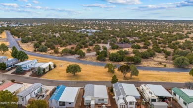 Great Location across from the green belt with panoramic sunset on Juniper Ridge R.V. Golf Resort in Arizona - for sale on GolfHomes.com, golf home, golf lot