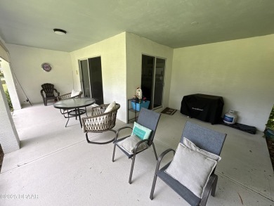 This Johnson-built block home is move in ready, located in the on Turnbull Bay Golf Club in Florida - for sale on GolfHomes.com, golf home, golf lot