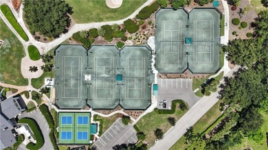 This 2-bedroom plus den villa offers sweeping golf course views on Estero Country Club in Florida - for sale on GolfHomes.com, golf home, golf lot