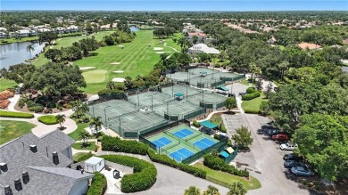 This 2-bedroom plus den villa offers sweeping golf course views on Estero Country Club in Florida - for sale on GolfHomes.com, golf home, golf lot