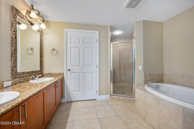 Experience luxury living in this beautiful two-bedroom on Oceans Golf Club in Florida - for sale on GolfHomes.com, golf home, golf lot