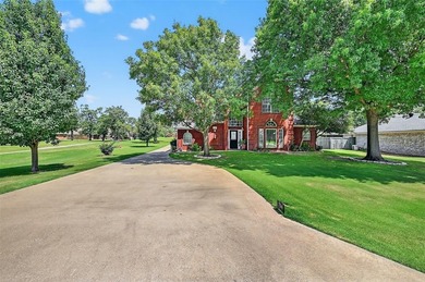 Location, location, location! This custom two-story brick home on Lake Kiowa Golf Course in Texas - for sale on GolfHomes.com, golf home, golf lot