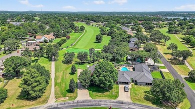 Location, location, location! This custom two-story brick home on Lake Kiowa Golf Course in Texas - for sale on GolfHomes.com, golf home, golf lot