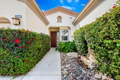 Step into timeless desert elegance at this pristine 2004 on Bermuda Dunes Country Club in California - for sale on GolfHomes.com, golf home, golf lot