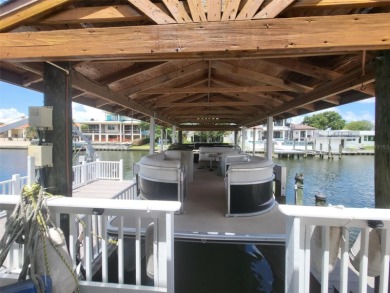 Are you looking for FLORIDA LIFESTYLE! WATERFRONT! Beautiful on Rocky Point Golf Course in Florida - for sale on GolfHomes.com, golf home, golf lot