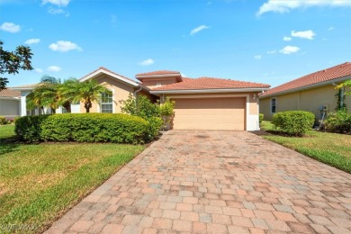 This beautifully designed, open concept home overlooks the 12th on Herons Glen Golf and Country Club in Florida - for sale on GolfHomes.com, golf home, golf lot