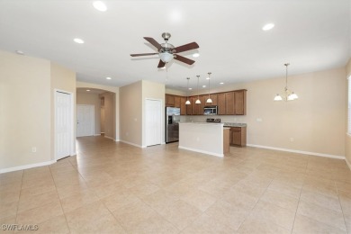 This beautifully designed, open concept home overlooks the 12th on Herons Glen Golf and Country Club in Florida - for sale on GolfHomes.com, golf home, golf lot