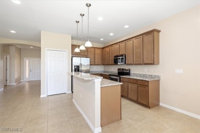 This beautifully designed, open concept home overlooks the 12th on Herons Glen Golf and Country Club in Florida - for sale on GolfHomes.com, golf home, golf lot