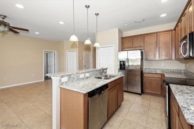 This beautifully designed, open concept home overlooks the 12th on Herons Glen Golf and Country Club in Florida - for sale on GolfHomes.com, golf home, golf lot