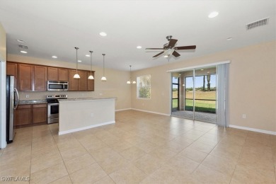 This beautifully designed, open concept home overlooks the 12th on Herons Glen Golf and Country Club in Florida - for sale on GolfHomes.com, golf home, golf lot