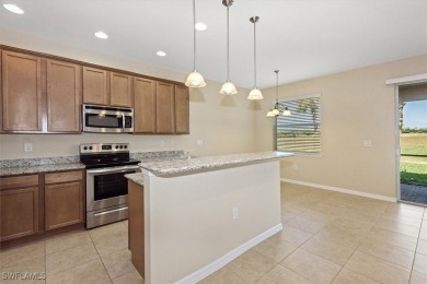 This beautifully designed, open concept home overlooks the 12th on Herons Glen Golf and Country Club in Florida - for sale on GolfHomes.com, golf home, golf lot