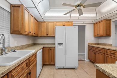 Welcome to 910 Bluewater in Sun City Center! This meticulously on Caloosa Greens Executive Golf Course in Florida - for sale on GolfHomes.com, golf home, golf lot