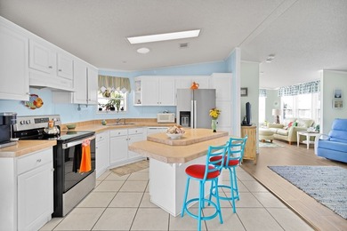 So so CUTE and SUPER Clean. ROOF & AC: 2018. Enjoy this adorable on Barefoot Bay Golf Course in Florida - for sale on GolfHomes.com, golf home, golf lot