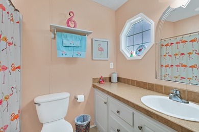 So so CUTE and SUPER Clean. ROOF & AC: 2018. Enjoy this adorable on Barefoot Bay Golf Course in Florida - for sale on GolfHomes.com, golf home, golf lot