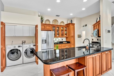 Welcome to this beautiful 4-bedroom, 3.5-bath townhome in on PGA National Golf Club in Florida - for sale on GolfHomes.com, golf home, golf lot