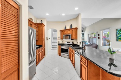 Welcome to this beautiful 4-bedroom, 3.5-bath townhome in on PGA National Golf Club in Florida - for sale on GolfHomes.com, golf home, golf lot