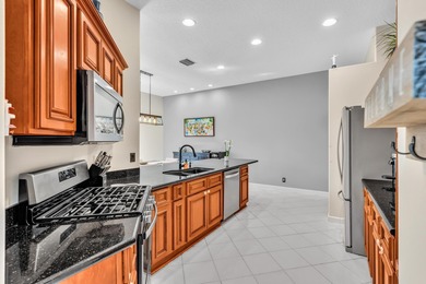 Welcome to this beautiful 4-bedroom, 3.5-bath townhome in on PGA National Golf Club in Florida - for sale on GolfHomes.com, golf home, golf lot