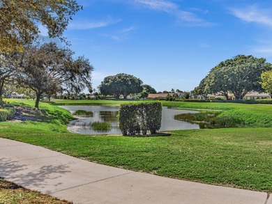 Paradise Awaits in this beautiful, renovated 3 bedroom, 2 bath on Indian Spring Golf and Country Club in Florida - for sale on GolfHomes.com, golf home, golf lot