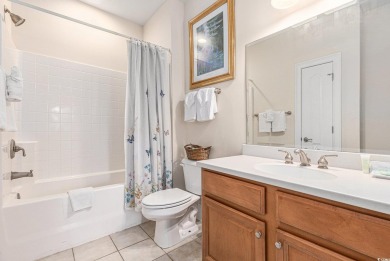 Experience luxury living with a direct golf course view in this on Barefoot Resort and Golf Club  in South Carolina - for sale on GolfHomes.com, golf home, golf lot