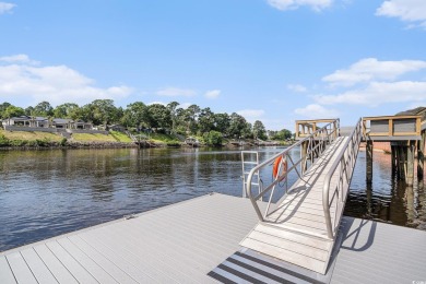 Experience luxury living with a direct golf course view in this on Barefoot Resort and Golf Club  in South Carolina - for sale on GolfHomes.com, golf home, golf lot