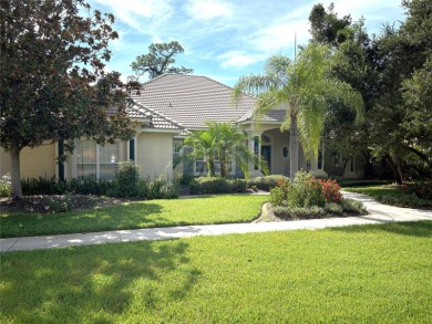 A beautiful LAKE FRONT home in the exclusive Gated Estates of on DeBary Golf and Country Club in Florida - for sale on GolfHomes.com, golf home, golf lot