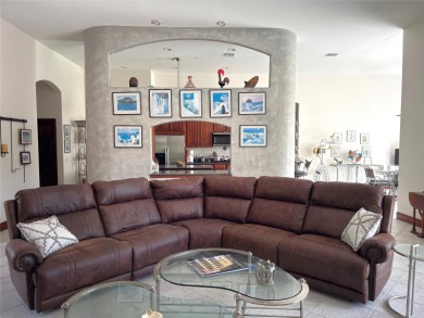A beautiful LAKE FRONT home in the exclusive Gated Estates of on DeBary Golf and Country Club in Florida - for sale on GolfHomes.com, golf home, golf lot