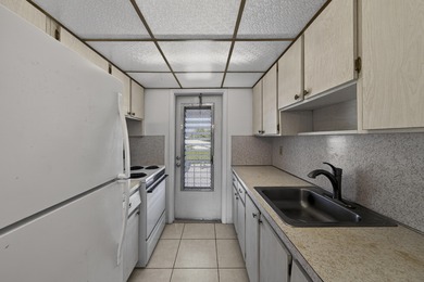 PRICE REDUCED! Pompano Beach 2 BR/2 BA Second Floor Condo on Leisureville Community Association in Florida - for sale on GolfHomes.com, golf home, golf lot