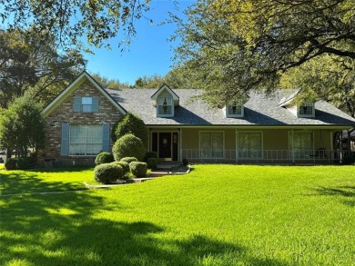 GORGEOUS CORNER LANDSCAPED DOUBLE LOT WITH LOTS OF TREES.This 2 on Pecan Plantation Country Club in Texas - for sale on GolfHomes.com, golf home, golf lot