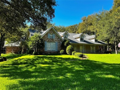 GORGEOUS CORNER LANDSCAPED DOUBLE LOT WITH LOTS OF TREES.This 2 on Pecan Plantation Country Club in Texas - for sale on GolfHomes.com, golf home, golf lot