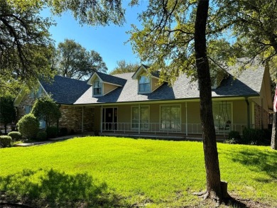 GORGEOUS CORNER LANDSCAPED DOUBLE LOT WITH LOTS OF TREES.This 2 on Pecan Plantation Country Club in Texas - for sale on GolfHomes.com, golf home, golf lot