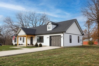 In 2021 this single-story home was custom-built on over half an on Mill Creek Golf Club in Ohio - for sale on GolfHomes.com, golf home, golf lot