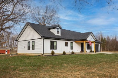 In 2021 this single-story home was custom-built on over half an on Mill Creek Golf Club in Ohio - for sale on GolfHomes.com, golf home, golf lot