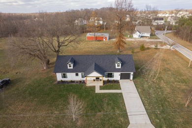 In 2021 this single-story home was custom-built on over half an on Mill Creek Golf Club in Ohio - for sale on GolfHomes.com, golf home, golf lot