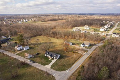 In 2021 this single-story home was custom-built on over half an on Mill Creek Golf Club in Ohio - for sale on GolfHomes.com, golf home, golf lot