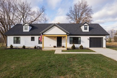 In 2021 this single-story home was custom-built on over half an on Mill Creek Golf Club in Ohio - for sale on GolfHomes.com, golf home, golf lot