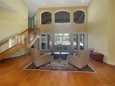 Crane Creek Fortress - Step inside this stunning CBS sanctuary on Martin Downs Country Club in Florida - for sale on GolfHomes.com, golf home, golf lot